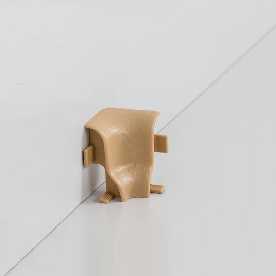 Innenecke für MDF-Sockelleisten 6x2 mm - Eiche Innenecke für MDF-Sockelleisten 6x2 mm - Eiche